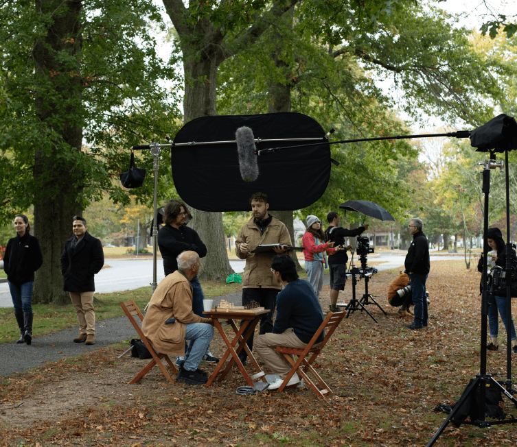 Behind the scenes of Studio Lewis crew preparing for a shoot